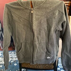 Nike hoodie size L (12/14). Approximately 22 inches long